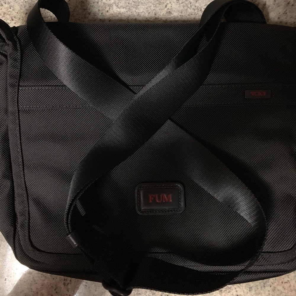 Small Tumi travel bag.